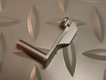 Wider lever with flat surface makes for positive slide lock reloads.